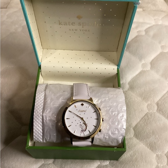 Kate Spade Watch With Crystal “Cheers” Display

Needs a battery - Picture 1 of 5